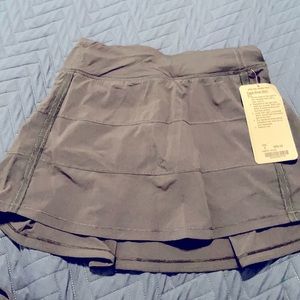 Black pleated tennis skirt